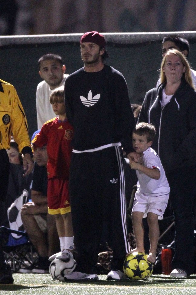 David Beckham, black addidas sweatshirt, track pants, black nylon pants